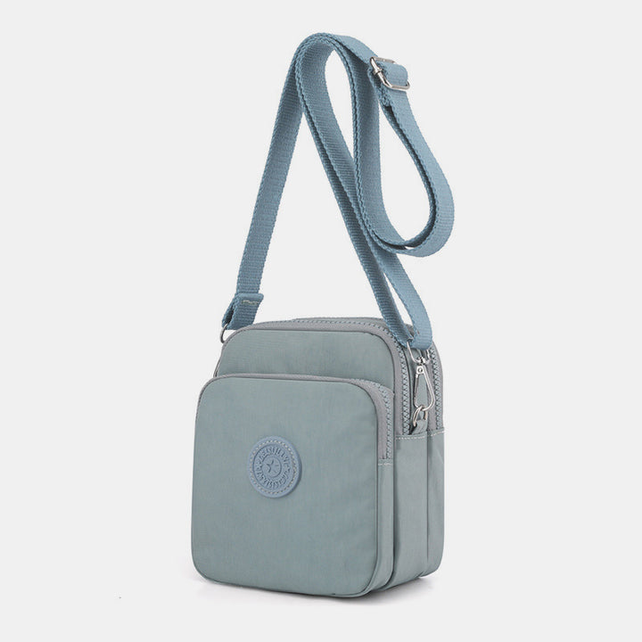 Wasserdichte, leichte, kleine Umhängetasche mit mehreren Taschen