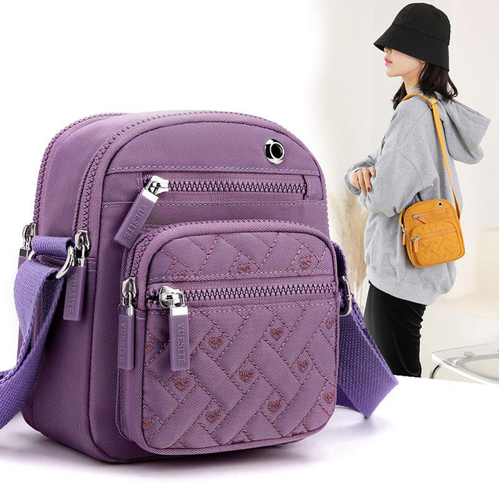 Lässige Umhängetasche aus Nylon mit mehreren Taschen und Loch für Kopfhörer