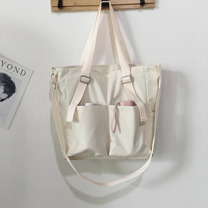 Große Tragetasche aus Canvas mit mehreren Taschen, funktionale Umhängetasche