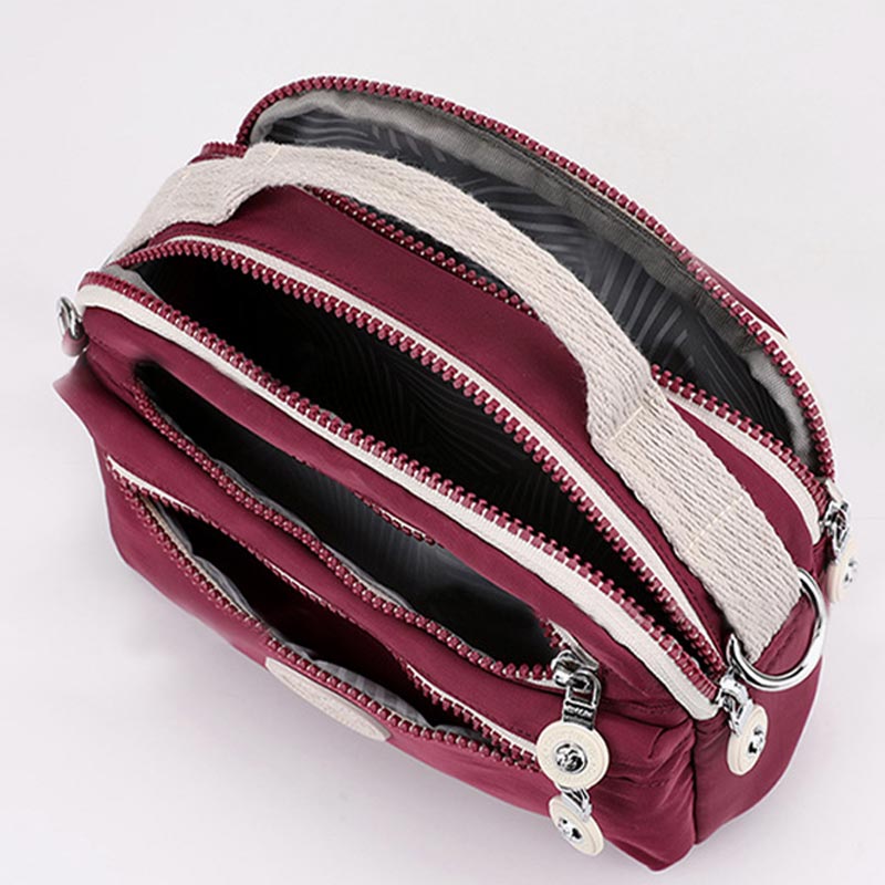 Leichte Handtasche aus Nylon mit mehreren Taschen, kleine Umhängetasche
