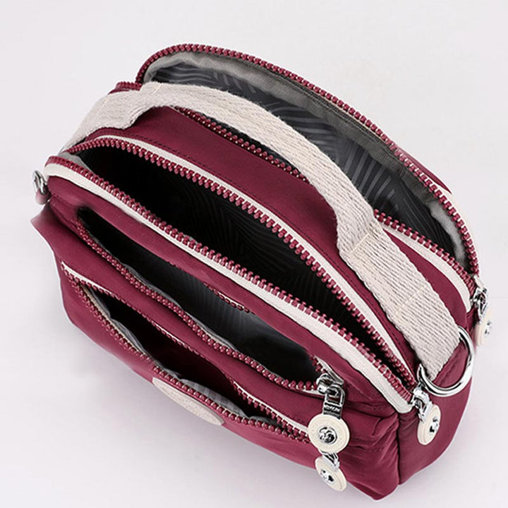 Leichte Handtasche aus Nylon mit mehreren Taschen, kleine Umhängetasche