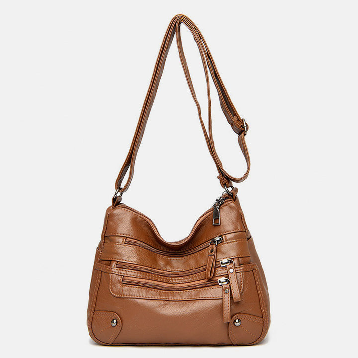 Umhängetasche mit großem Fassungsvermögen und mehreren Taschen