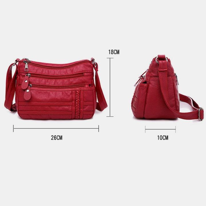Einfarbige Umhängetasche mit mehreren Taschen