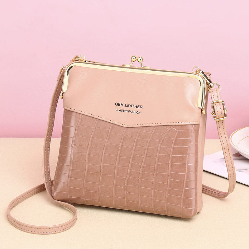 Leder-Crossbody-Handtasche für Damen mit zwei Fächern und Kiss Lock-Umhängetasche