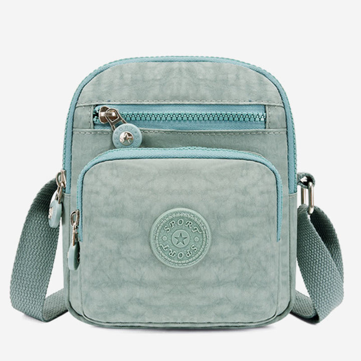 Leichte kleine Umhängetasche in Volltonfarbe mit mehreren Taschen für Mobiltelefone