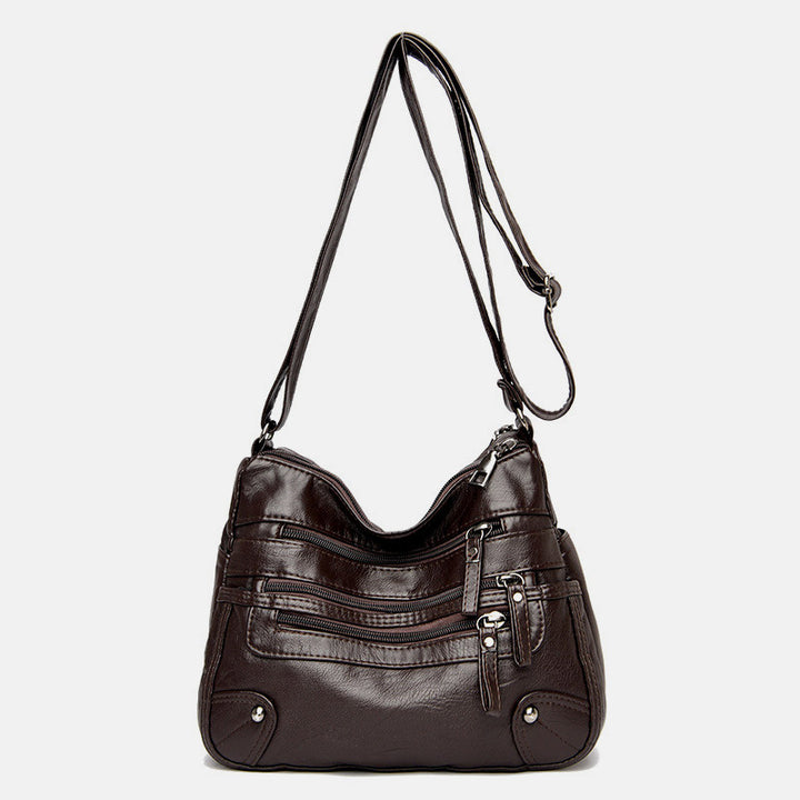 Umhängetasche mit großem Fassungsvermögen und mehreren Taschen