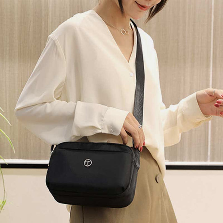 Kleine Umhängetasche mit dreifachem Reißverschluss für Damen, leichte, lässige Schultertasche
