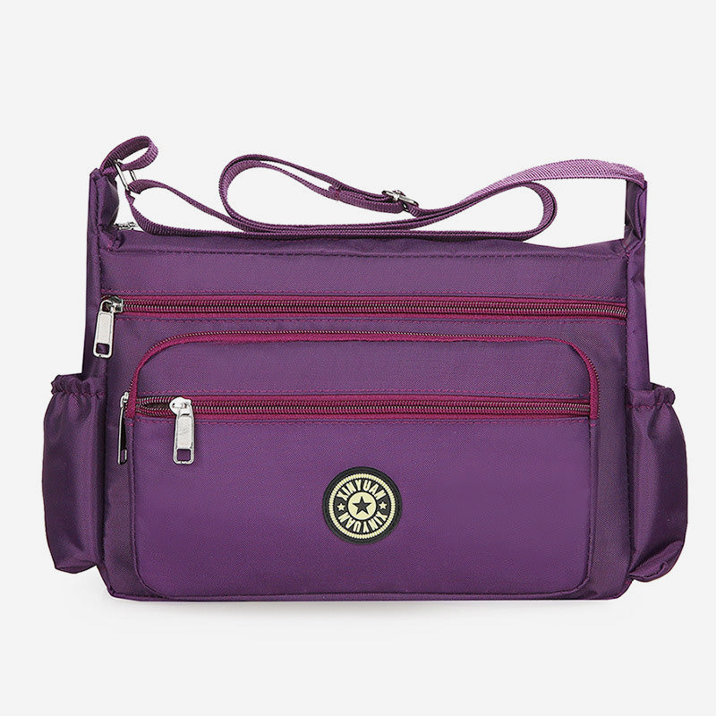 Wasserdichte Umhängetasche mit mehreren Taschen und Aufdruck