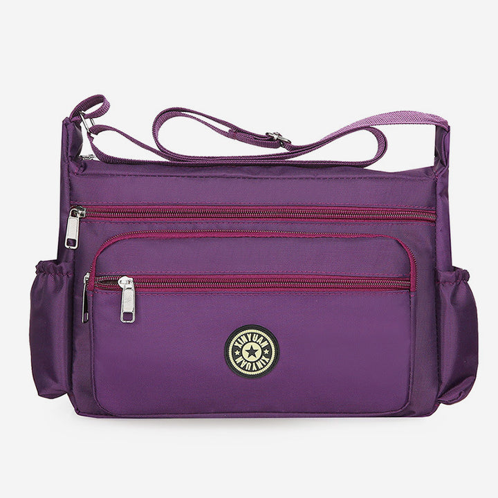 Wasserdichte Umhängetasche mit mehreren Taschen und Aufdruck