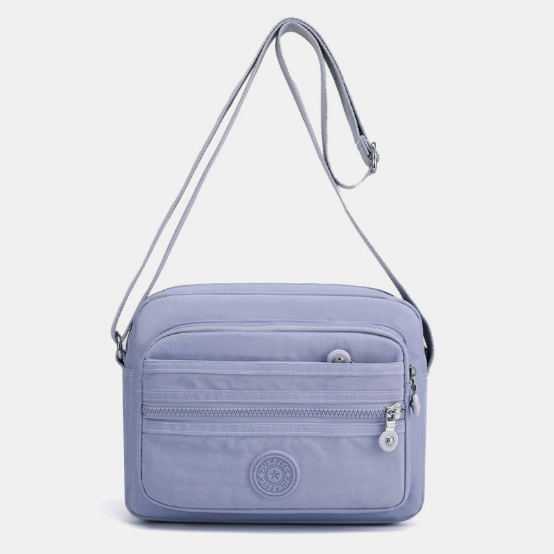 Lässige Umhängetasche mit mehreren Taschen und leichtem Design