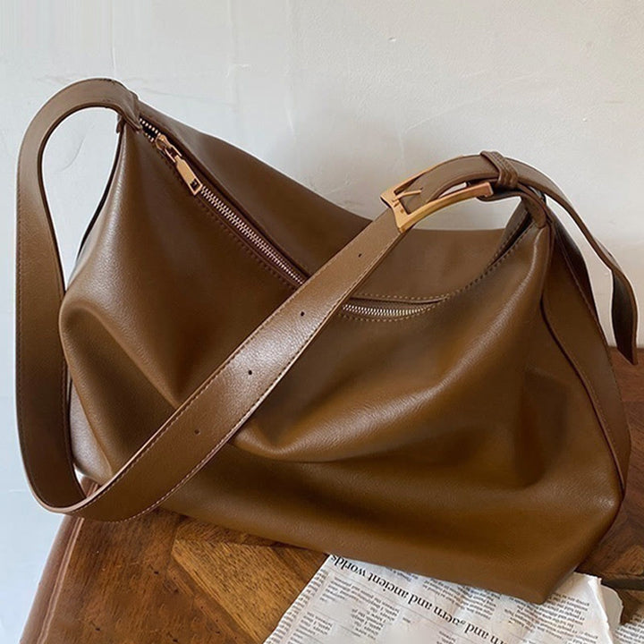 Damen Handtasche aus weichem Leder mit breiten Riemen, Vintage-Umhängetasche
