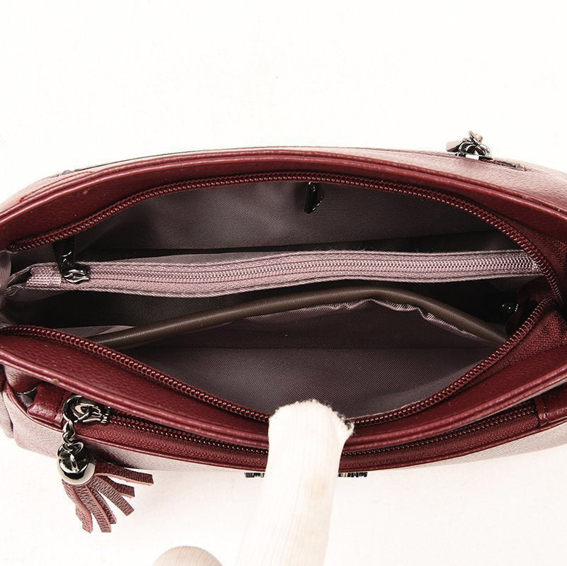 Umhängetasche aus echtem Leder für Damen, kleine Umhängetasche mit Quaste