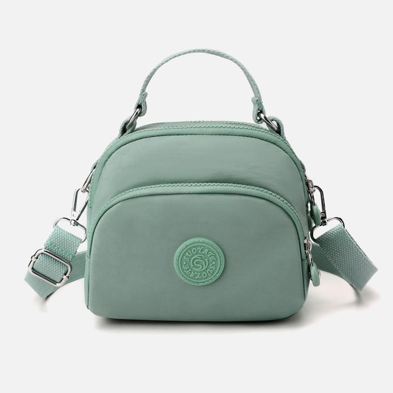 Leichte, wasserabweisende Handtasche für Damen mit mehreren Taschen