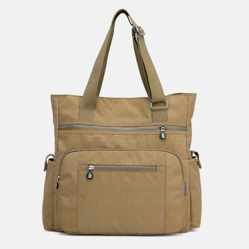 Wasserabweisende Reisehandtasche mit großem Fassungsvermögen