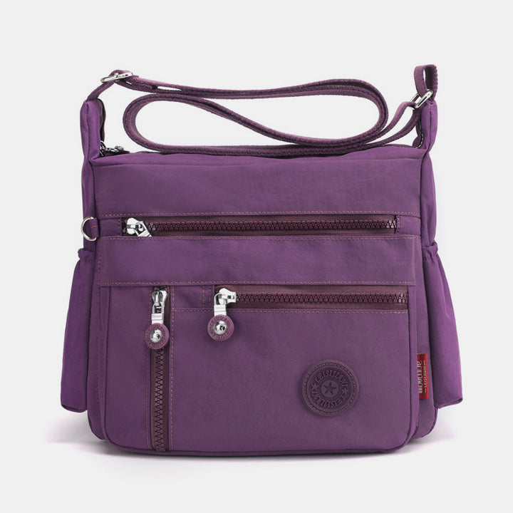 Große, wasserdichte, leichte Umhängetasche mit mehreren Taschen - Lila - image 13