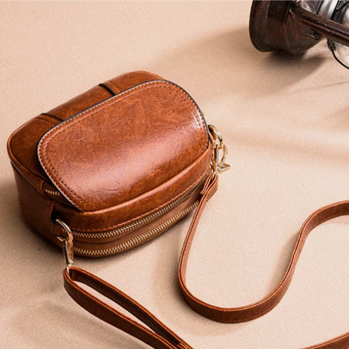 Kleine Umhängetasche aus Leder mit dreifachem Reißverschluss, Schultertasche für Damen