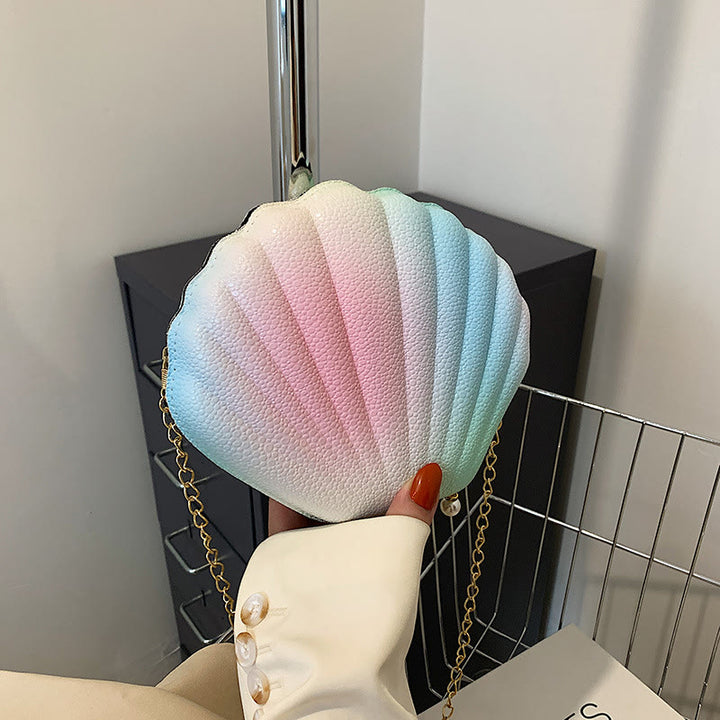 Umhängetasche für Damen mit Muschelmuster und Lederstruktur