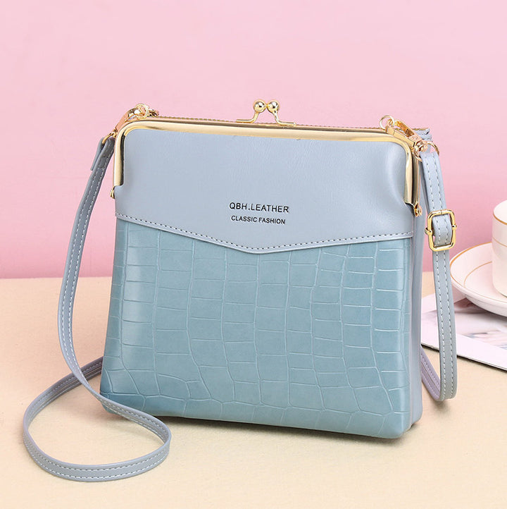 Leder-Crossbody-Handtasche für Damen mit zwei Fächern und Kiss Lock-Umhängetasche