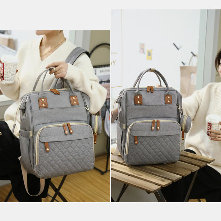 Multifunktionale Mama-Tasche mit Kinderbett, einfacher wasserdichter Oxford-Rucksack
