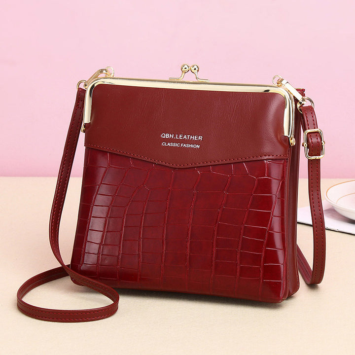 Leder-Crossbody-Handtasche für Damen mit zwei Fächern und Kiss Lock-Umhängetasche