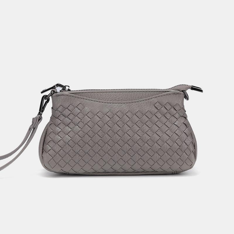 Stilvolle gewebte Umhängetasche mit Armband