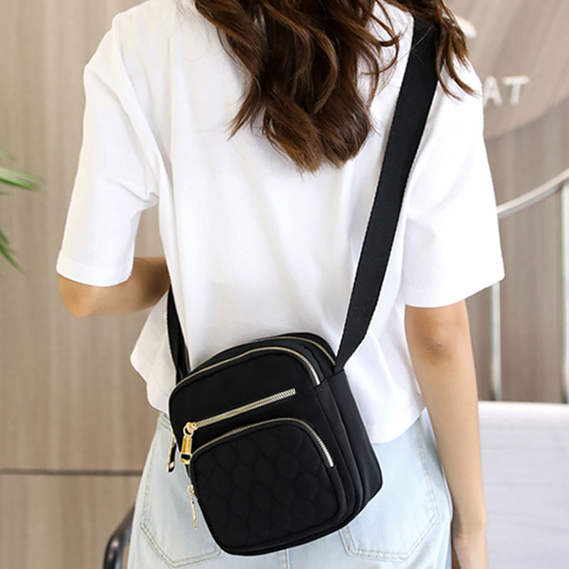 Messenger Bag mit großem Fassungsvermögen und mehreren Taschen