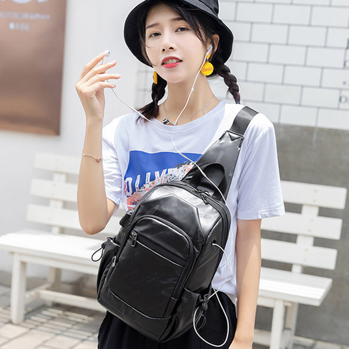 Kleine schwarze Sling-Umhängetasche für Damen und Herren, Tagesrucksack mit USB-Ladegerät