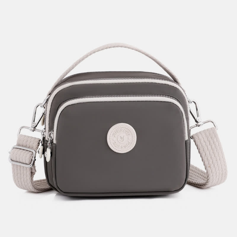 Kleine Handtasche mit dreifachem Reißverschluss für Damen, leichte, wasserdichte Umhängetasche