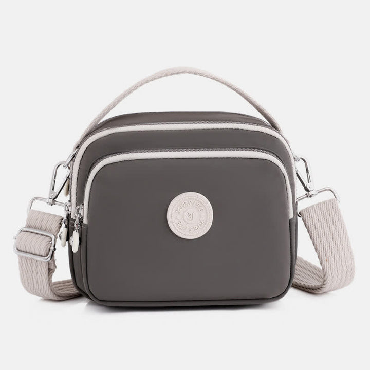Kleine Handtasche mit dreifachem Reißverschluss für Damen, leichte, wasserdichte Umhängetasche
