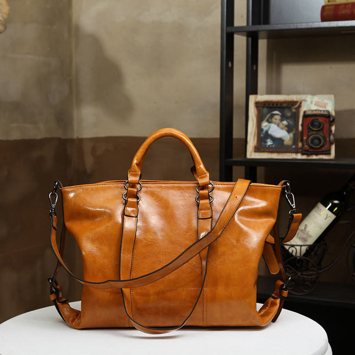 Große Reisetasche für Damen, minimalistische Handtasche aus schlichtem Leder