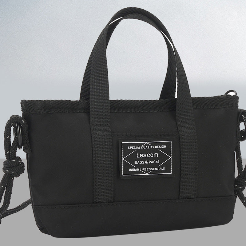 Kleine schwarze Retro-Umhängetasche für Unisex mit Henkel oben