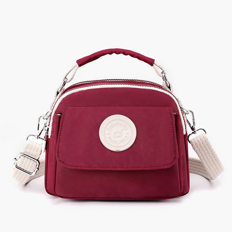 Tasche mit Griff oben für Damen, einfache, tragbare Umhängetasche mit Spritzschutz