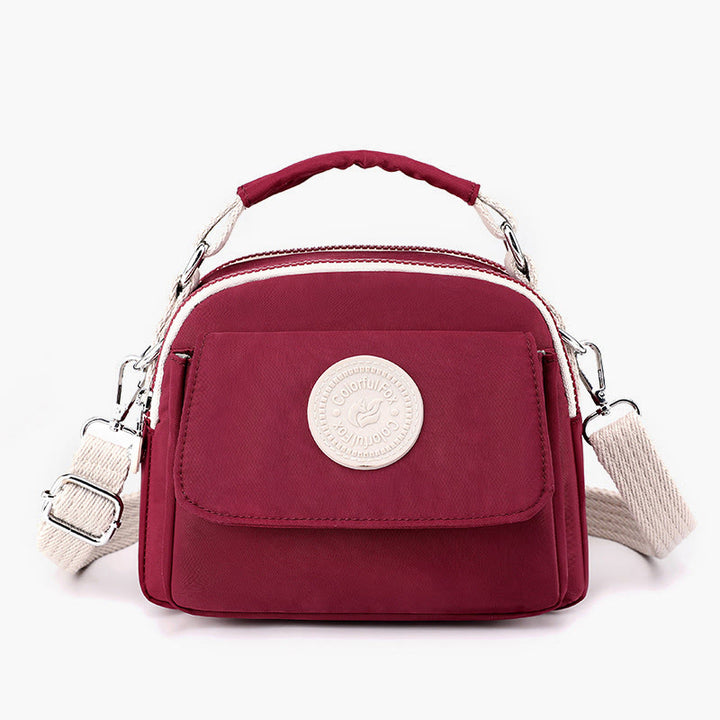 Tasche mit Griff oben für Damen, einfache, tragbare Umhängetasche mit Spritzschutz
