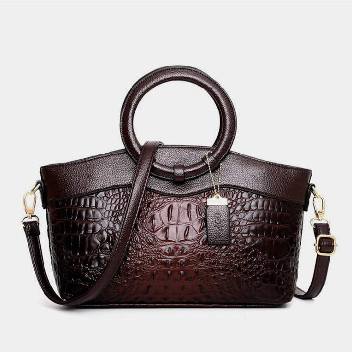 Umhängetasche mit großem Fassungsvermögen und Vintage-Prägung und Henkeltasche