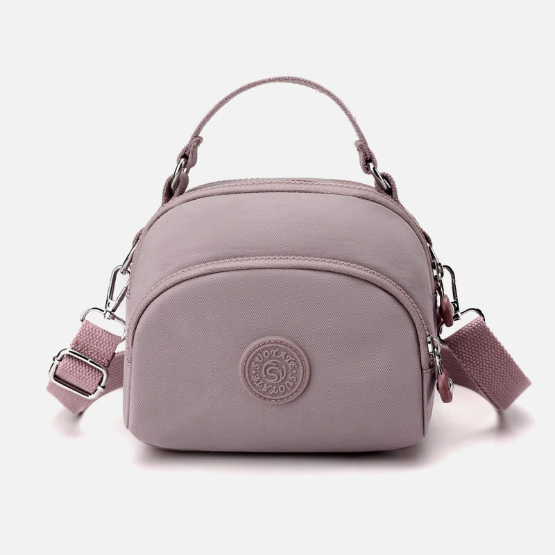 Leichte, wasserabweisende Handtasche für Damen mit mehreren Taschen