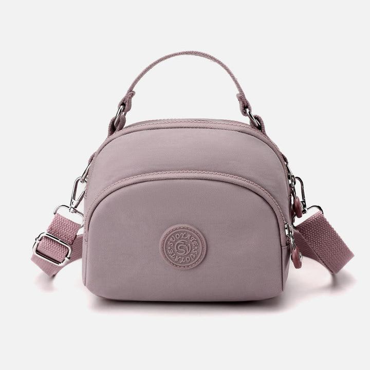Leichte, wasserabweisende Handtasche für Damen mit mehreren Taschen