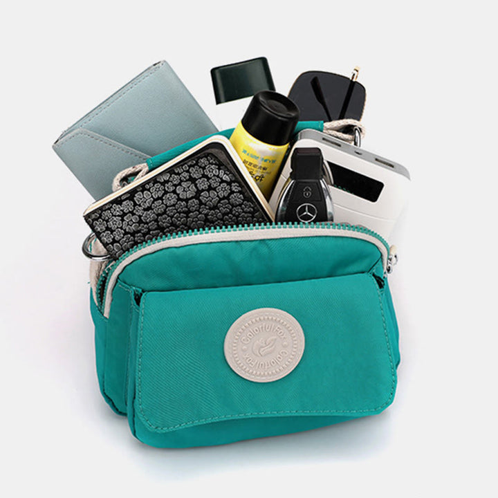 Tasche mit Griff oben für Damen, einfache, tragbare Umhängetasche mit Spritzschutz