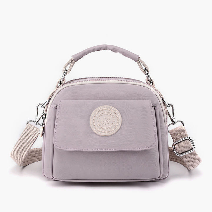 Tasche mit Griff oben für Damen, einfache, tragbare Umhängetasche mit Spritzschutz
