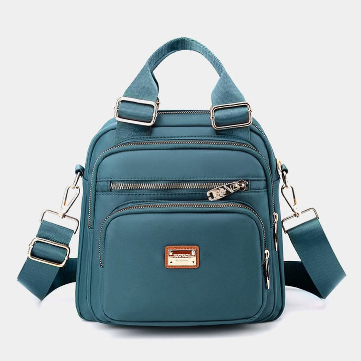 Wasserdichter Umhängetaschen-Rucksack mit mehreren Taschen