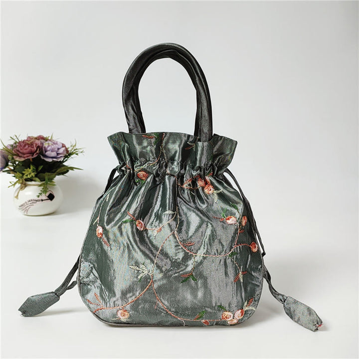 Clutch mit Blumenmuster und Kordelzug, Beuteltasche, Handtasche, Partytasche