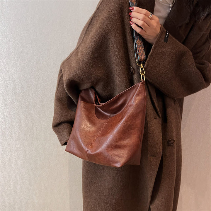 Retro-Umhängetasche für Damen mit breiten Riemen, raffinierte Tragetasche