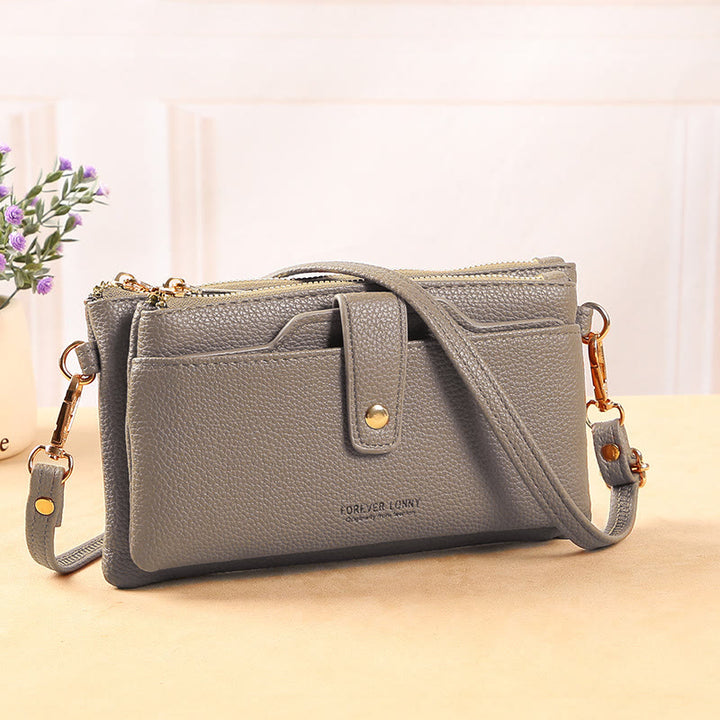 Handytasche mit zwei Fächern für Damen, multifunktionale Umhängetasche aus Leder