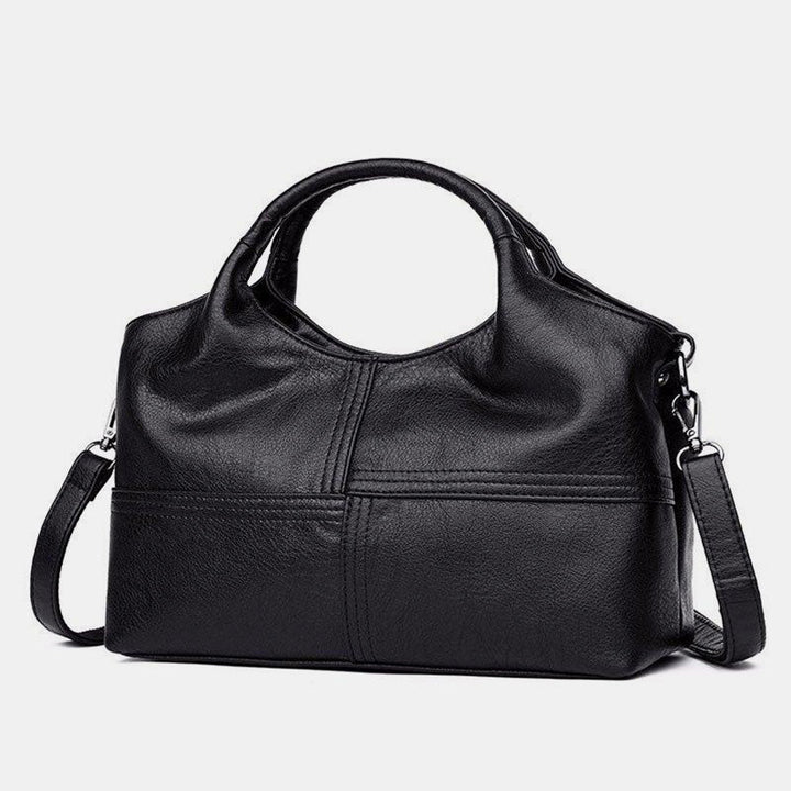 Weiche Lederhandtasche mit Nähten und fester Umhängetasche