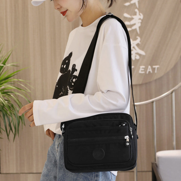 Lässige Umhängetasche mit mehreren Taschen und leichtem Design