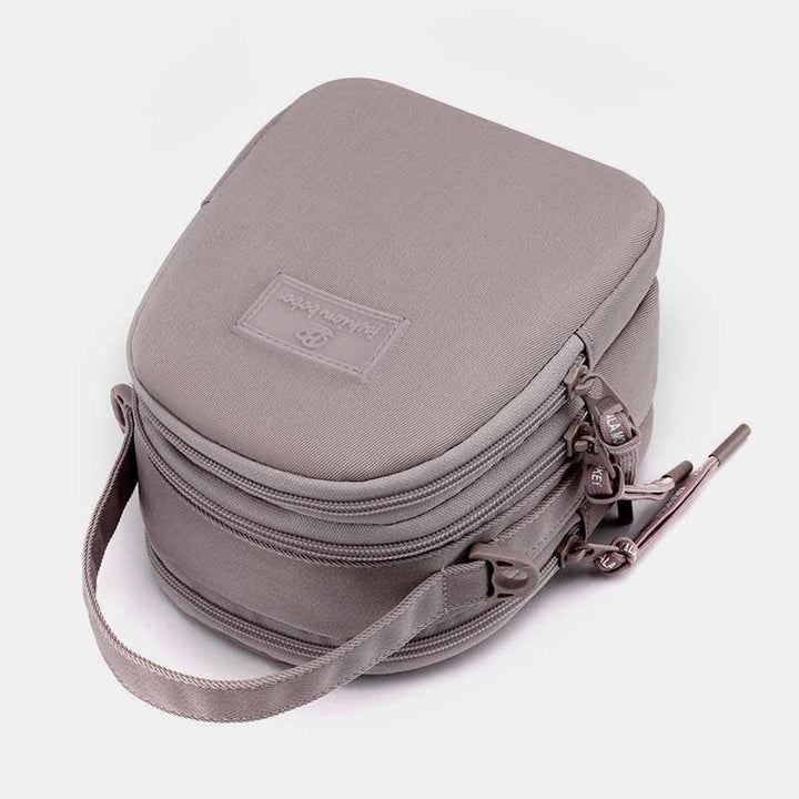 Umhängetasche mit dreifachem Reißverschluss für Damen, wasserdichte Mini-Reisehandtasche