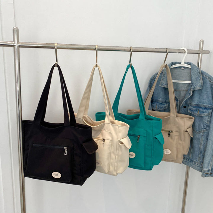 Tragetasche für Damen, schlichte Schultertasche mit Abzeichen-Dekor