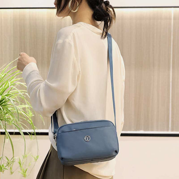 Kleine Umhängetasche mit dreifachem Reißverschluss für Damen, leichte, lässige Schultertasche