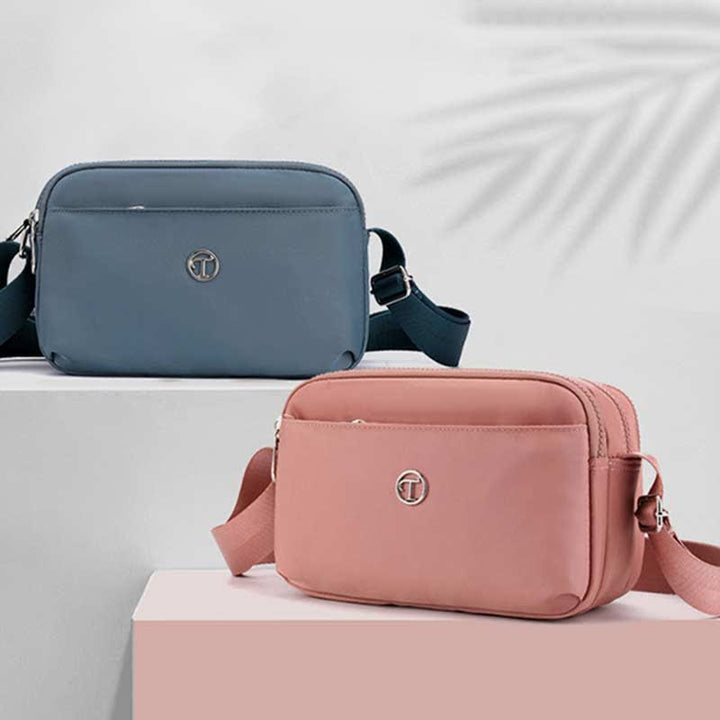 Kleine Umhängetasche mit dreifachem Reißverschluss für Damen, leichte, lässige Schultertasche