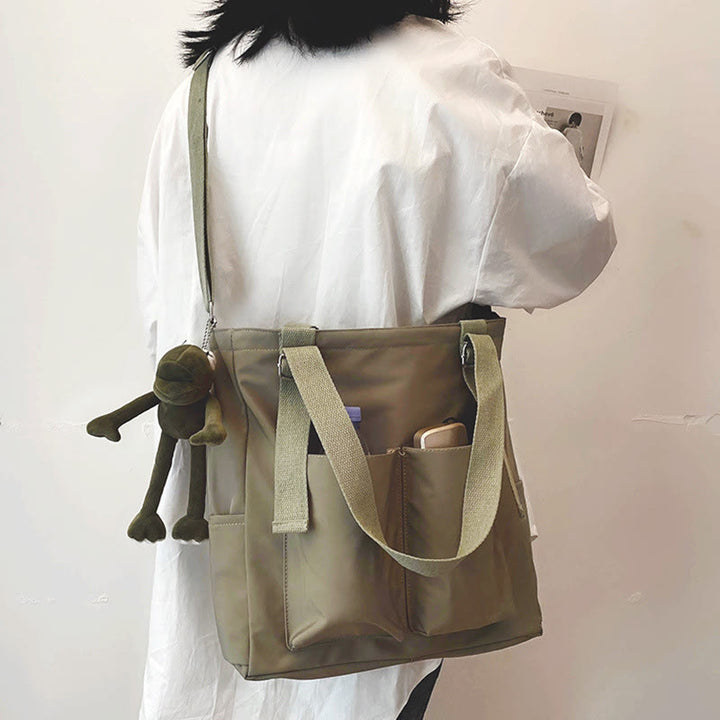 Große Tragetasche aus Canvas mit mehreren Taschen, funktionale Umhängetasche