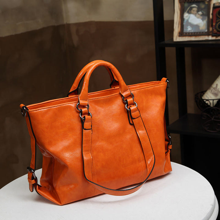 Große Reisetasche für Damen, minimalistische Handtasche aus schlichtem Leder